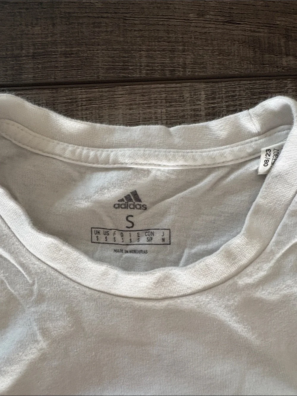 adidas White Long-Sleeve Tee with Red Manchester United Detailing